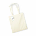 A plain off-white canvas tote bag, branded as WM801 by Westford Mill, featuring two long handles and displayed flat against a white background. The bag includes a small green tag on the side and is adorned with two paper tags attached to the handle.