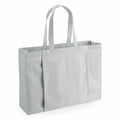 Introducing the WM818 by Westford Mill, a minimalist light grey fabric tote bag featuring two elongated handles and a sleek rectangular design.