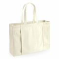 The product, known as the WM818 from Westford Mill, is a plain beige fabric tote bag with two long handles, shown against a white background. It features a rectangular shape and an open top design that embodies a simple, minimalist aesthetic.