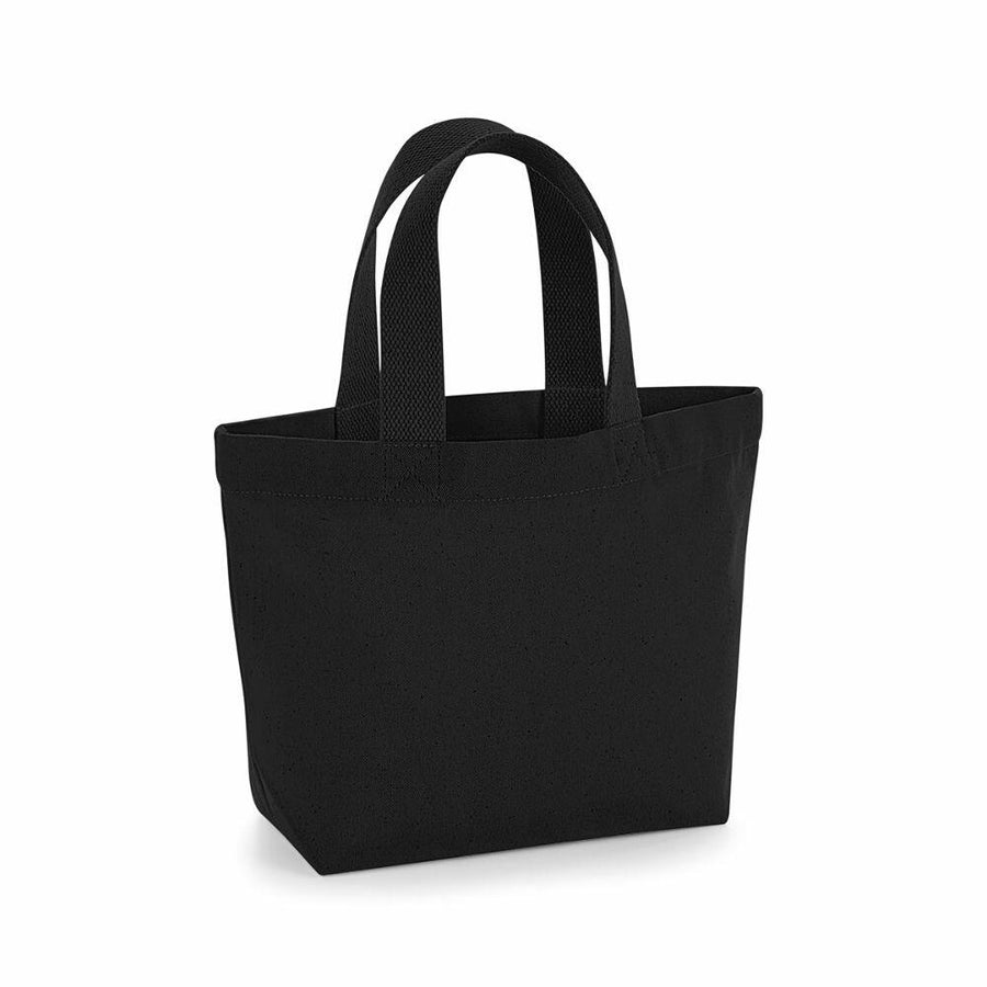 A WM845 black tote bag by Westford Mill, featuring two handles and standing upright against a plain white background.