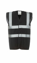 A Yoko safety vest, model YK001, in black featuring two horizontal silver reflective stripes on the front.