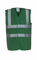 The Yoko YK001 is a green safety vest featuring reflective silver stripes across the front and around the waist. It boasts a simple, sleeveless design with a label at the collar.