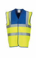 The Yoko YK001 high-visibility safety vest, designed in bright yellow and blue with reflective silver horizontal and vertical stripes, is displayed against a plain white background.