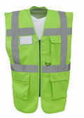A Yoko YK002 safety vest in lime green, featuring reflective gray stripes and multiple pockets, displayed against a plain background.