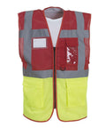 The Yoko YK015 is a red and yellow high-visibility safety vest featuring reflective gray stripes. It includes multiple pockets and a front zipper closure.