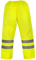 YK070 safety pants by Yoko in neon yellow featuring reflective gray stripes near the ankles.