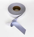 A roll of Yoko's YK203 gray ribbon partially unspooled on a white background.