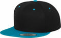 The YP002 by Flexfit By Yupoong is a black snapback hat featuring a turquoise brim and matching turquoise button on top. It includes small turquoise eyelets for ventilation and has a sticker on the underside of the brim.