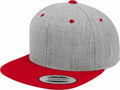 A gray YP002 snapback hat from Flexfit By Yupoong, featuring a red visor, red button on top, and red eyelets. The brim includes a sticker stating "The Classic Yupoong Since 1974 Snapback.