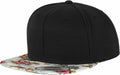 A Flexfit By Yupoong YP003 snapback hat featuring a black design and a floral-patterned brim.