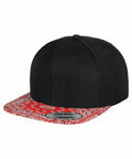 A black snapback cap with a red paisley-patterned brim, the YP003 by Flexfit By Yupoong.