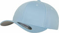 A Flexfit By Yupoong YP004 cap is displayed in light blue, featuring a curved brim with a sticker. The cap is presented from a slightly angled side view, emphasizing its simple design and structured shape.