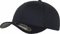 A black baseball cap with a slightly curved brim, featuring a small sticker on the brim displaying Flexfit By Yupoong branding. The YP004 cap has a clean and plain appearance without any visible logos or designs.