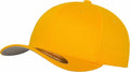 The YP004 from Flexfit By Yupoong is a bright yellow baseball cap featuring a curved brim with a small round sticker on its front. It boasts a smooth texture and is designed with several small ventilation holes on top.