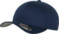 A YP004 baseball cap in plain dark blue, featuring a curved brim with a small sticker showcasing the Flexfit By Yupoong brand and size details. It is constructed with six panels and has a button on top.