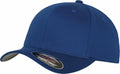 A YP004 blue baseball cap by Flexfit By Yupoong, featuring a curved brim and a sticker on the front indicating its size and brand.