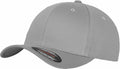 The YP004 by Flexfit By Yupoong is a plain gray baseball cap with a rounded crown and curved brim, featuring ventilation eyelets on the top and a sticker with brand details visible on the brim.