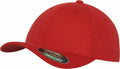 The YP006 baseball cap by Flexfit By Yupoong features a plain red design with a curved brim and a round crown, complete with a sticker on the brim displaying text.