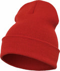 The Flexfit By Yupoong YP012 is a bright red knit beanie featuring a folded brim. Displayed against a plain white background, it showcases its soft texture and vibrant color.