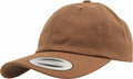 A YP022 baseball cap by Flexfit By Yupoong in brown features a curved brim and a front sticker that says "The Classics Authentic." This cap has a six-panel design and is made of fabric.