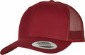 A red YP023 snapback trucker cap by Flexfit By Yupoong, featuring a mesh back and solid front panel with a circular sticker on the brim indicating its authenticity.