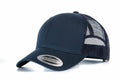 The YP023 snapback cap by Flexfit By Yupoong is dark blue with a curved brim and features a mesh back for ventilation. The brim has a sticker displaying the word Snapback, and the cap is showcased against a white background.