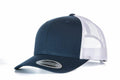 A Flexfit By Yupoong YP023 trucker cap in navy blue and white, featuring a curved brim, mesh back, and a Snapback label on the brim.