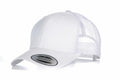 A white YP023 snapback cap by Flexfit By Yupoong, featuring a curved brim and mesh back panel, is displayed on a white surface. A sticker with the words "The Classic Snapback" is visible on the brim.