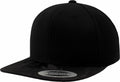 A YP025 by Flexfit By Yupoong, which is a plain black snapback cap featuring a flat brim and a sticker on the visor.