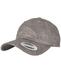 A Flexfit By Yupoong YP034 baseball cap in gray, featuring a curved brim and visible stitching, placed against a plain white background.