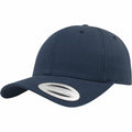 A plain navy blue YP035 baseball cap by Flexfit By Yupoong, featuring a curved brim and a sticker on the front.
