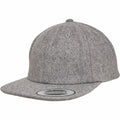 The YP037 by Flexfit By Yupoong is a gray wool baseball cap featuring a flat brim and an adjustable strap at the back.