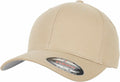 The YP045 by Flexfit By Yupoong is a beige baseball cap featuring a curved brim and a front sticker. It offers a plain, snug fit and highlights a minimalist design.