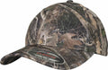 A YP057 camouflage baseball cap by Flexfit By Yupoong, featuring a forest pattern with the Flexfit logo on the brim.