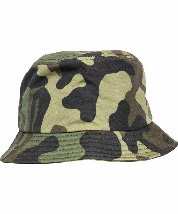 A Flexfit By Yupoong YP068 camouflage-patterned bucket hat with green, brown, and black colors.