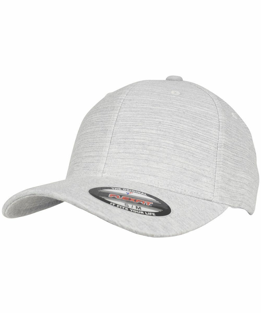 A light gray Flexfit By Yupoong YP107 baseball cap with a curved brim and a sticker on the front indicating its size.