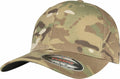 A YP112 baseball cap by Flexfit By Yupoong, featuring a curved brim and a camouflage pattern in shades of green, brown, and beige, complete with a sticker on the brim indicating the brand.