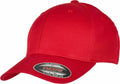 A bright red baseball cap with a curved brim and a sticker on the front, labeled as YP113 by Flexfit By Yupoong. The cap is plain without any logos or additional designs.
