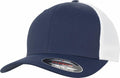 A YP128 trucker cap in navy blue and white, featuring a sticker on the brim, by Flexfit By Yupoong.