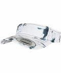 A white tie-dye adjustable visor cap with black patterns and a label on the brim, called YP170 by Flexfit By Yupoong.