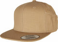 Flexfit By Yupoong's YP171 is a tan snapback cap with a flat brim, side pocket, and a brim sticker.