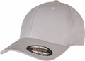 The YP174 cap by Flexfit By Yupoong is a light gray baseball cap featuring a curved brim and a button on top. It includes a round Flexfit sticker on the brim, indicating it is size S/M, and boasts a simple, unadorned design.