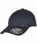 A dark blue baseball cap with an attached sticker on the brim that reads "Flexfit By Yupoong YP176.