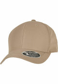A Flexfit By Yupoong YP189 beige baseball cap featuring a curved brim and a sticker on the front.