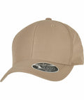 Beige baseball cap with a round sticker on the brim displaying "YP189 Flexfit By Yupoong".