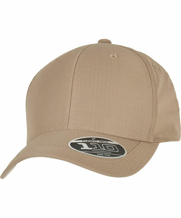 Beige baseball cap with a round sticker on the brim displaying "YP189 Flexfit By Yupoong".