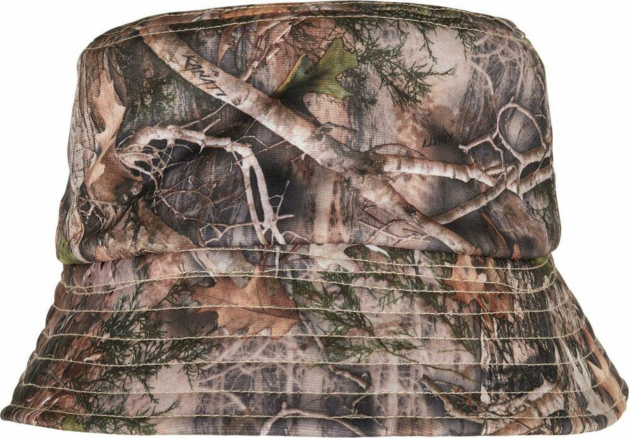 The Flexfit By Yupoong YP204 is a camouflaged bucket hat with a forest pattern that includes branches and leaves.