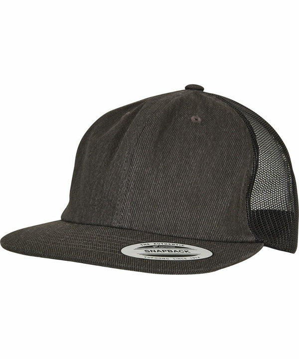 A dark gray snapback hat with a curved brim and mesh back panel. A sticker on the brim displays the Flexfit By Yupoong YP209.