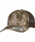 A camouflage baseball cap with a mesh back and snapback closure, displaying a "Flexfit By Yupoong" brand sticker on the brim and featuring product number YP234.