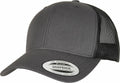 The YP237 by Flexfit By Yupoong is a gray snapback cap featuring a curved brim and a mesh back panel. The brim has a white oval sticker displaying "Snapback" and "Yupoong Since 1974.